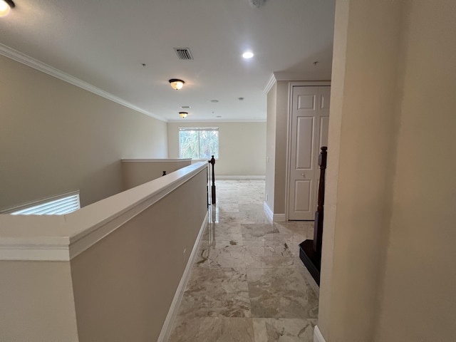 hall with visible vents, baseboards, marble finish floor, crown molding, and an upstairs landing