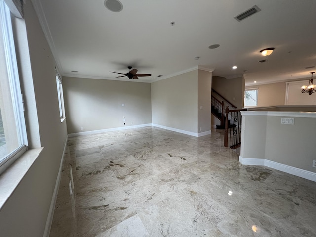 unfurnished living room with marble finish floor, baseboards, and visible vents