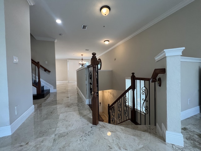 interior space featuring marble finish floor, a notable chandelier, crown molding, visible vents, and baseboards