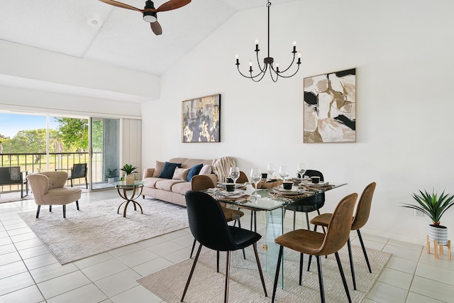 dining area with high vaulted ceiling, light tile patterned flooring, baseboards, and ceiling fan with notable chandelier