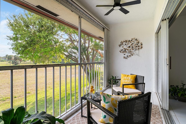 balcony featuring a ceiling fan