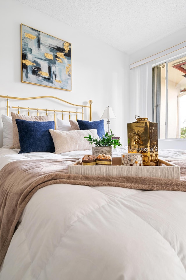 bedroom featuring a textured ceiling