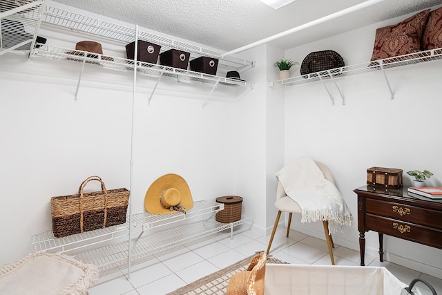 walk in closet featuring tile patterned floors