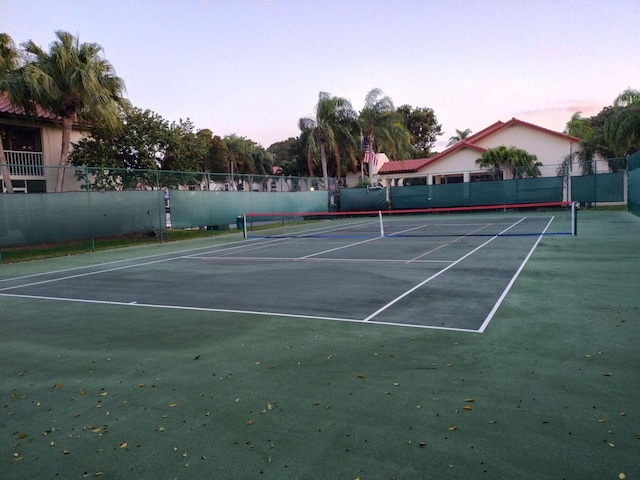 view of sport court with fence