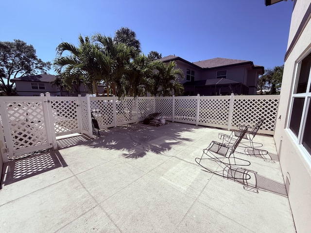 view of patio with fence