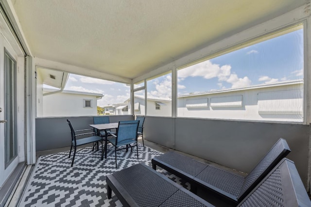 balcony featuring outdoor dining space