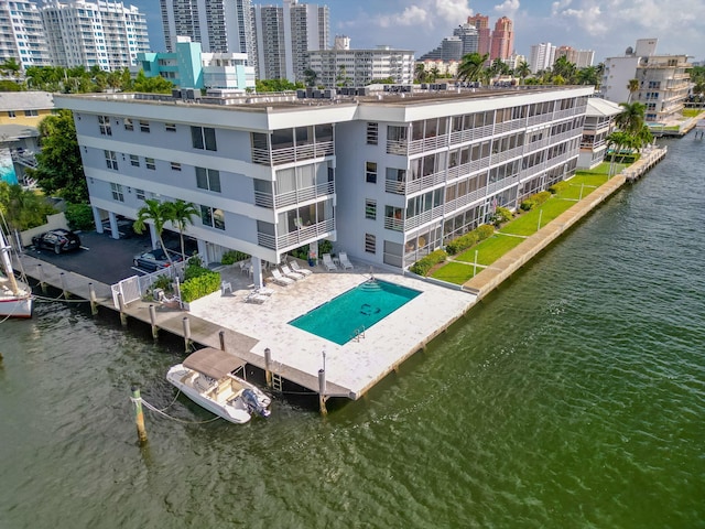 aerial view featuring a water view and a city view