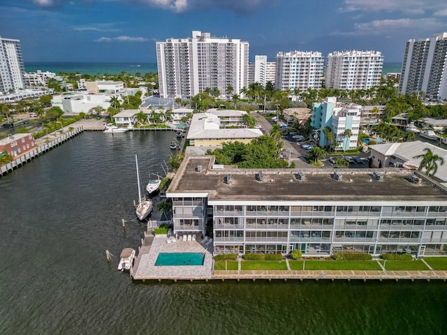 bird's eye view with a water view and a view of city