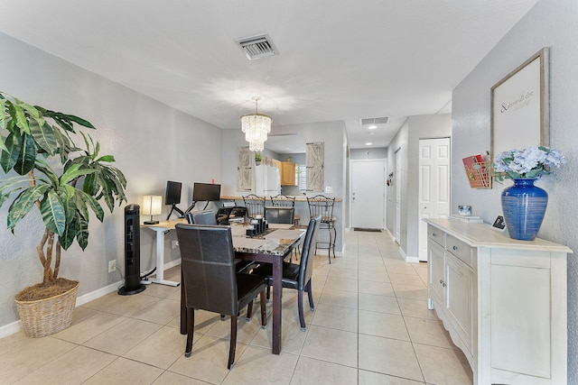 dining room featuring visible vents, baseboards, and light tile patterned floors