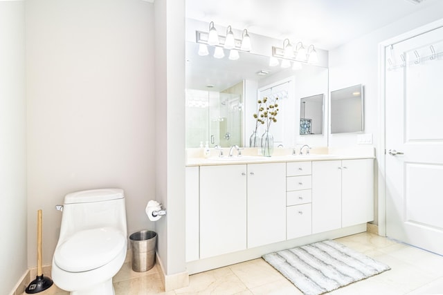 full bath with double vanity, a shower stall, toilet, and a sink