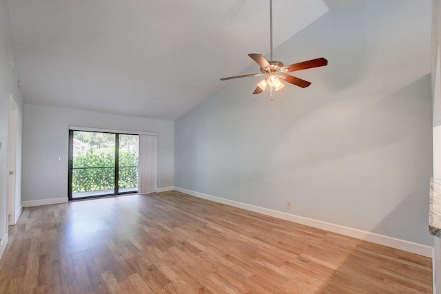 spare room featuring light wood finished floors, ceiling fan, and baseboards