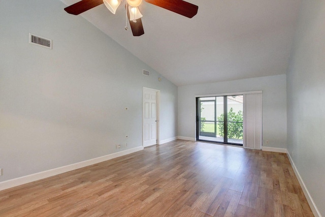 spare room featuring light wood-style flooring, visible vents, and baseboards