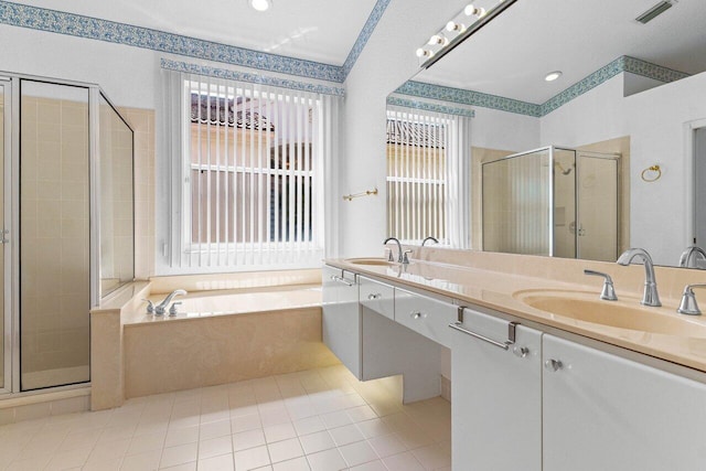 full bath featuring a garden tub, a stall shower, a sink, and visible vents