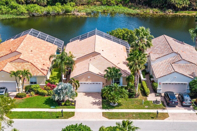 birds eye view of property featuring a water view