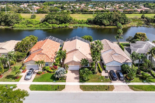 aerial view with a residential view and a water view