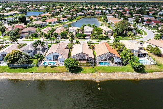 aerial view featuring a water view and a residential view