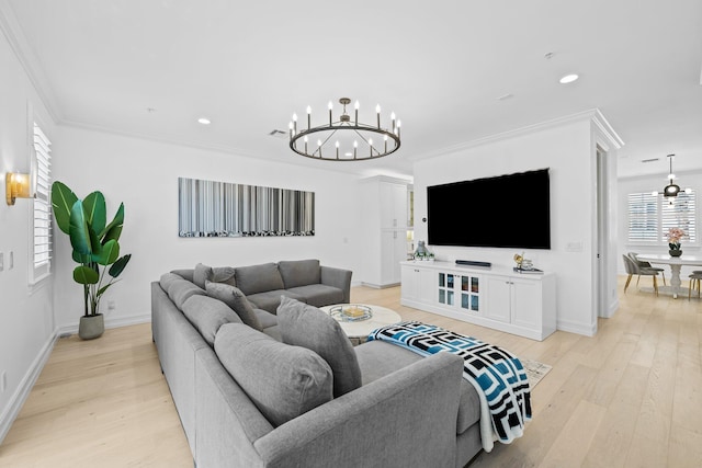 living room with a chandelier, light wood finished floors, recessed lighting, and crown molding