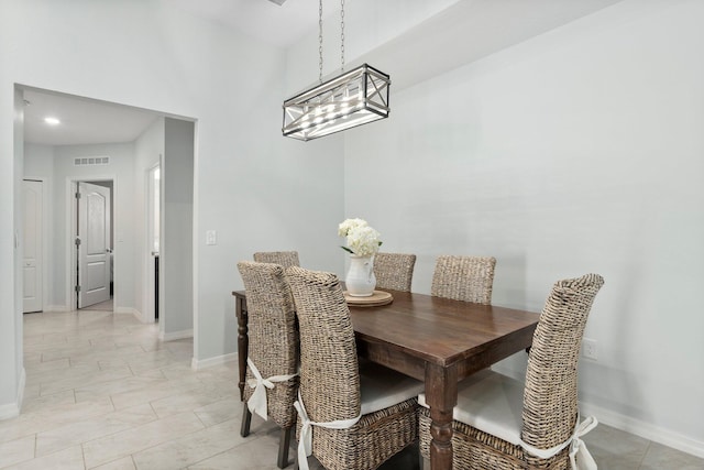 dining area featuring visible vents and baseboards