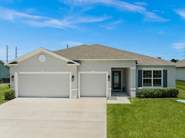 ranch-style house with a garage, stucco siding, roof with shingles, and a front yard