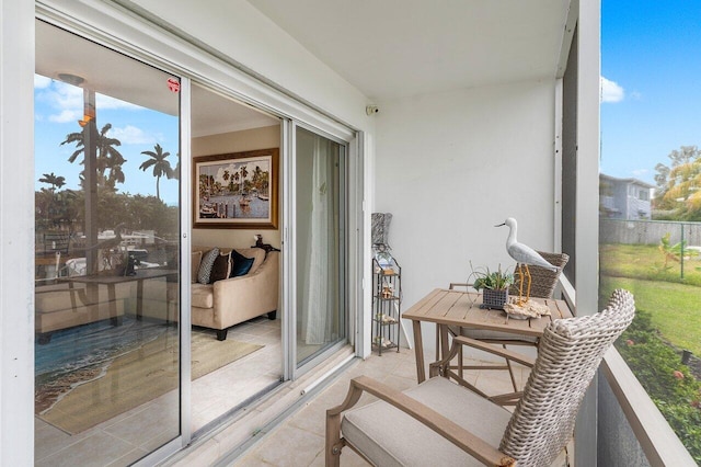 balcony featuring a sunroom