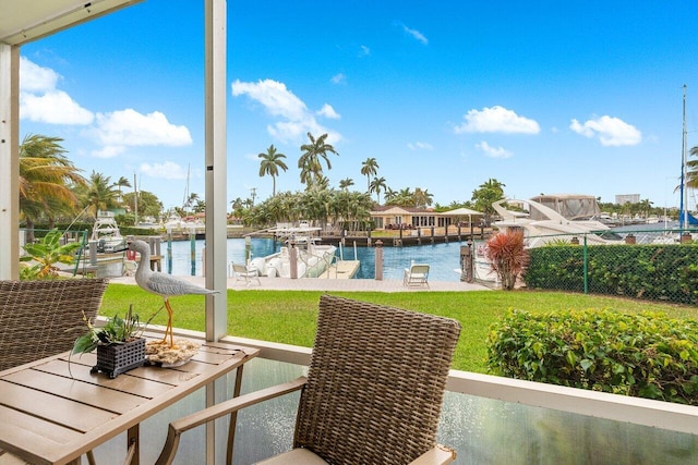 sunroom with a water view