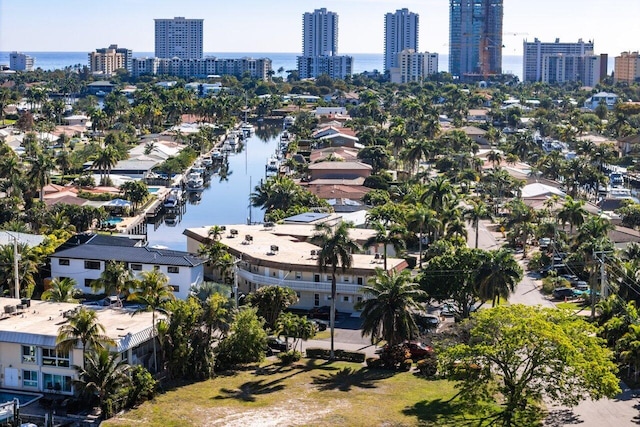 bird's eye view featuring a city view and a water view