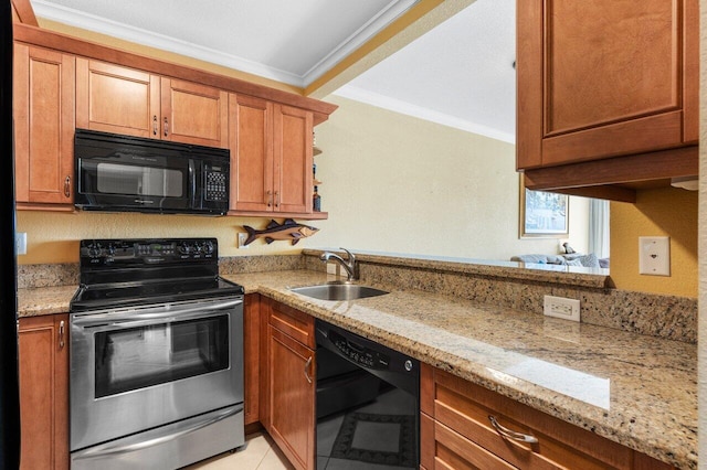 kitchen featuring a sink, light stone countertops, black appliances, and ornamental molding