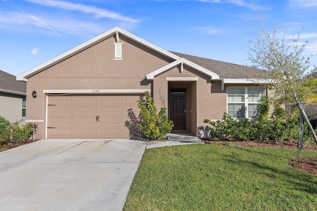 ranch-style house with roof with shingles, stucco siding, concrete driveway, an attached garage, and a front yard