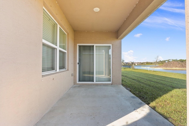 view of patio / terrace featuring a water view