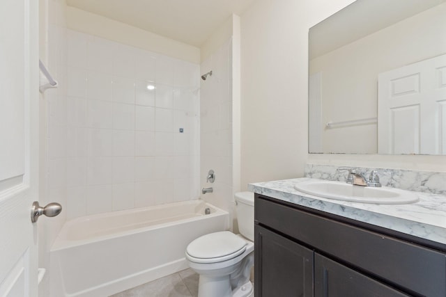 bathroom with shower / tub combination, tile patterned flooring, vanity, and toilet