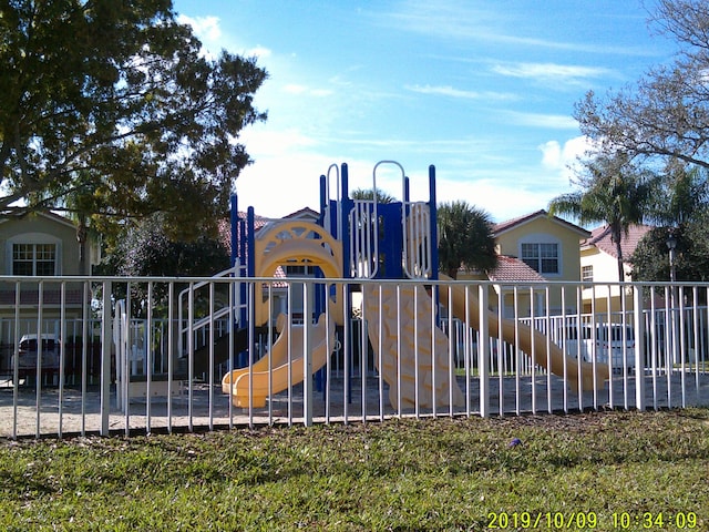 view of play area featuring fence