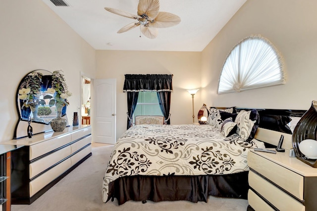 carpeted bedroom with a ceiling fan