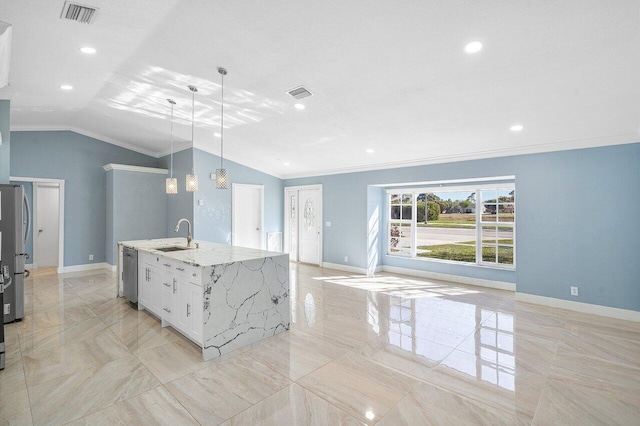 kitchen with dishwasher, vaulted ceiling, a sink, and visible vents