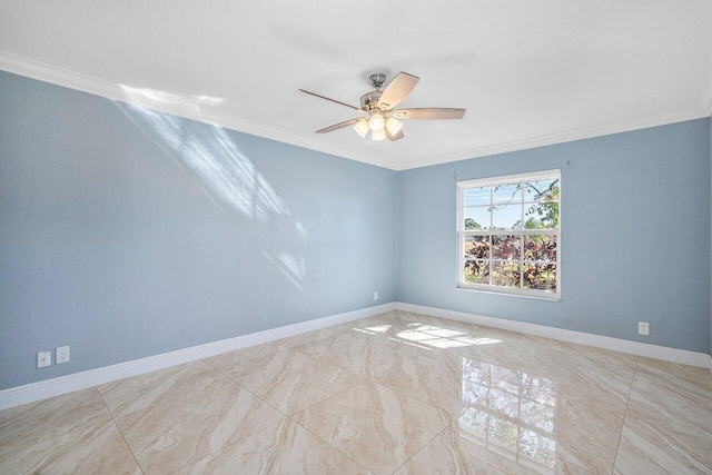 unfurnished room featuring baseboards, ornamental molding, and a ceiling fan