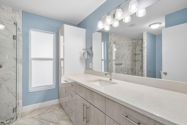 full bath featuring marble finish floor, baseboards, visible vents, and a marble finish shower