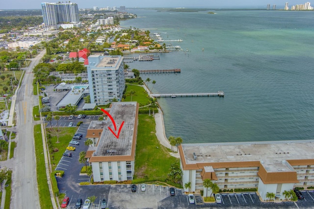 aerial view featuring a water view and a city view