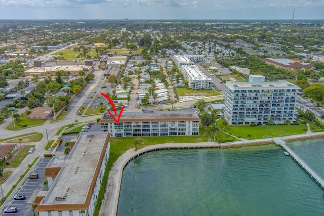 drone / aerial view with a water view