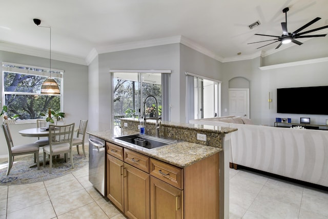 kitchen with visible vents, brown cabinets, open floor plan, a sink, and stainless steel dishwasher