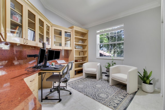 office area featuring ornamental molding, baseboards, and light tile patterned floors