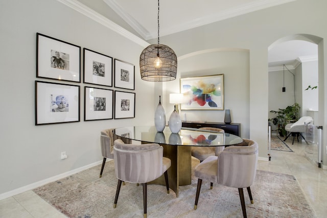 dining room with arched walkways, ornamental molding, light tile patterned floors, and baseboards