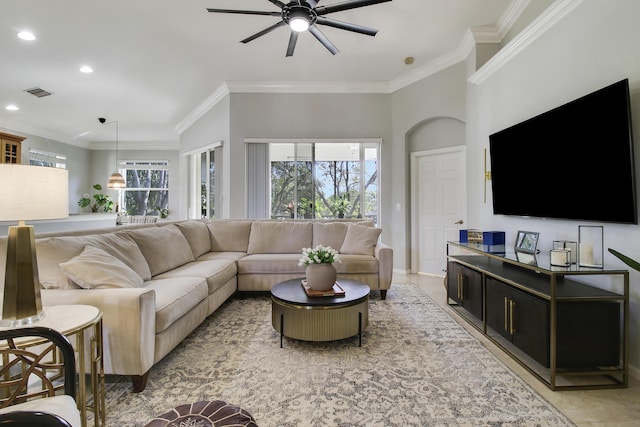 living room featuring light tile patterned floors, visible vents, ceiling fan, crown molding, and recessed lighting