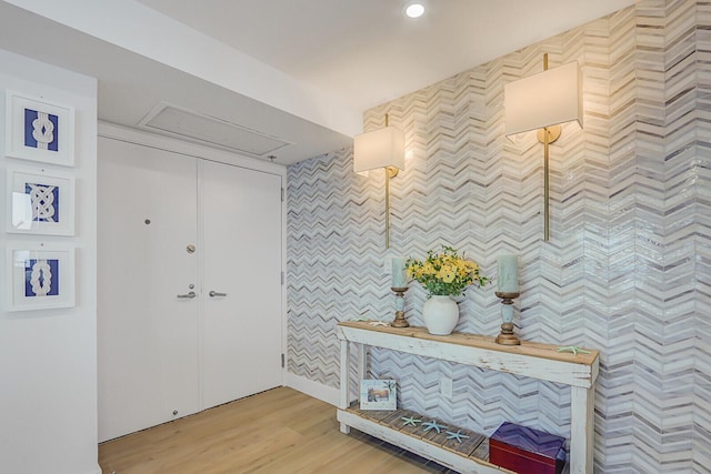 foyer featuring recessed lighting and light wood-style flooring