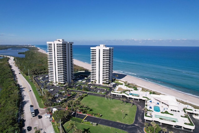 aerial view featuring a water view and a view of the beach