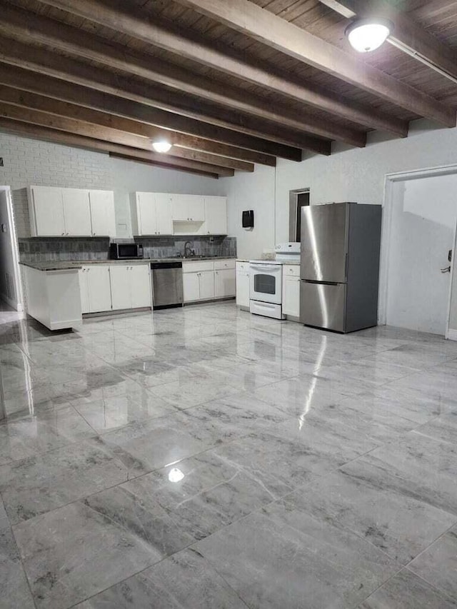 kitchen with appliances with stainless steel finishes, dark countertops, wooden ceiling, and white cabinets