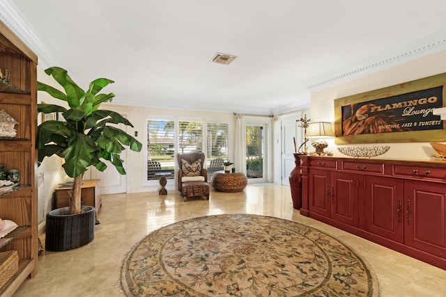 living area with visible vents and crown molding