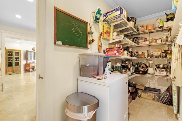 laundry room featuring recessed lighting and crown molding