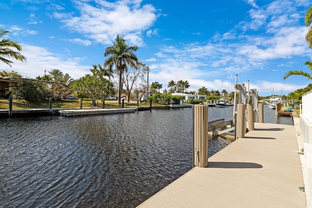 view of dock with a water view and boat lift