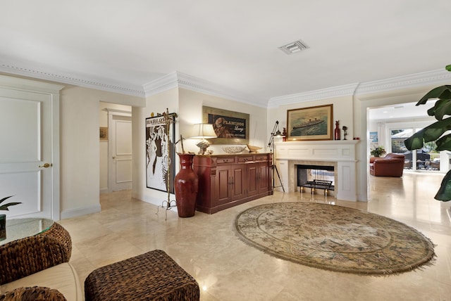 bedroom featuring visible vents, a multi sided fireplace, baseboards, and ornamental molding