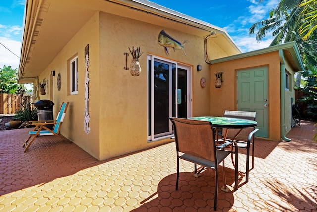 view of patio / terrace with fence and outdoor dining space