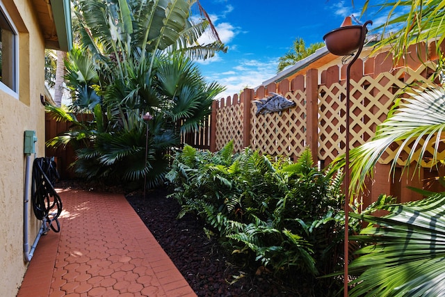 view of patio / terrace featuring fence